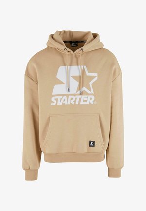 Sudadera beige de algodón, con un gran logo blanco de "Starter", bolsillo frontal, capucha con cordón y puños acanalados.