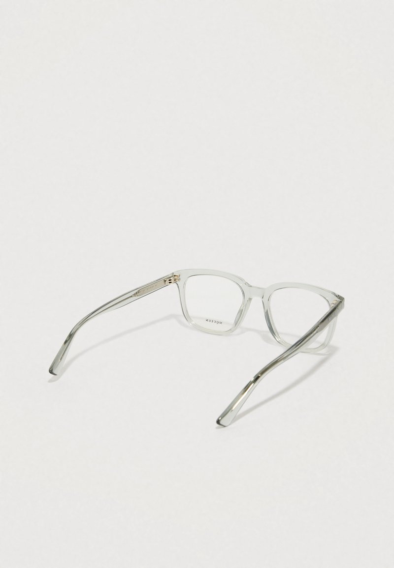 Gafas de ver rectangulares transparentes con brazos metálicos delgados, que presentan un armazón transparente, un diseño minimalista y sin patrones o acentos visibles.