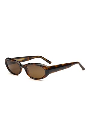 Tortoiseshell oval-frame sunglasses with brown lenses, slightly curved arms, and a glossy finish, shown angled on a white background.