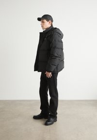 Tommy Jeans ALASKA PUFFER - Vinterjacka - black