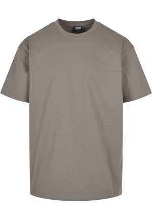 T-shirt en coton gris avec un col rond, des manches courtes et une coupe décontractée. Texture lisse sans motifs ni accents visibles.