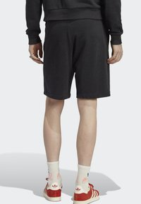 adidas Originals ESSENTIALS MADE - Tracksuit bottoms - black