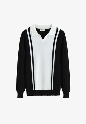 Pull en maille à manches longues noir et blanc avec un col blanc, un panneau vertical blanc et des rayures noires sur le devant et les manches.