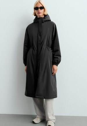OYSHO, 10K THINDOWN® WATERPROOF SUPER EXTRA-LIGHT LONG PADDED JACKET - Classic coat - black