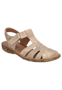 Beige Leder-Sandalette mit mehreren ausgeschnittenen Riemen, einem verstellbaren seitlichen Schnallenverschluss und einer strukturierten braunen Sohle für besseren Halt.