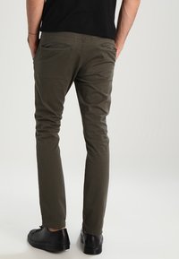 Nudie Jeans Trousers - olive