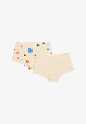 Due paia di biancheria intima in cotone: una di colore beige uniforme, l'altra beige con motivi a cuore colorati in blu, verde, arancione, rosa e giallo.