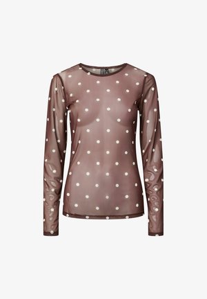 Haut transparent marron à manches longues avec des pois blancs et un col rond, en tissu légèrement transparent, vue de face sur fond blanc.