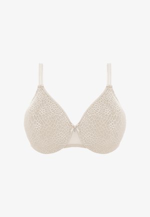 Reggiseno in pizzo beige con coppe preformate, spalline regolabili e un accento decorativo centrale. Il motivo floreale copre le coppe e le ali.