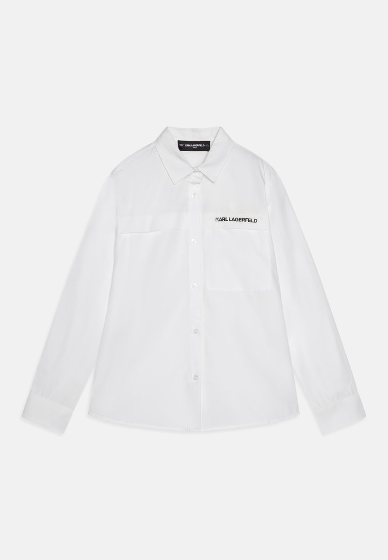 Bela srajca s kratkimi rokavi iz gladkega materiala, z žepom na prsih in diskretnim črnim logotipom "KARL LAGERFELD" spredaj.