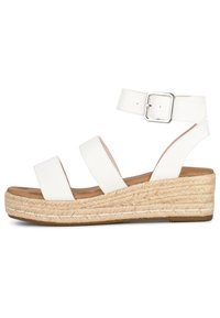 Sandali wedge bianchi con tre fasce larghe, una finitura testurizzata e una suola in juta intrecciata. Presenta una fibbia metallica sulla fascia ankle.