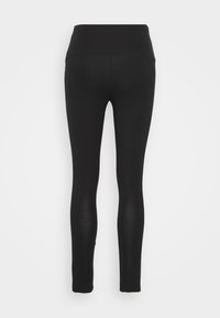 Czarne legginsy z wysokim stanem, wykonane z gładkiego, elastycznego materiału. Design dopasowany do ciała z bezszwowym wyglądem.