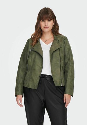 Olive green faux leather jacket with a moto design, zippered front and pockets, paired with a white V-neck t-shirt and black pants.