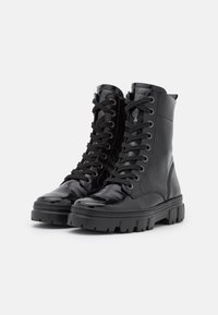 Paul Green Botines con plataforma - black