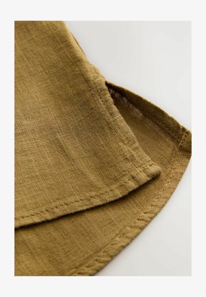 Brown linen fabric with a slightly textured surface, featuring a folded hem and visible stitching along the edges.