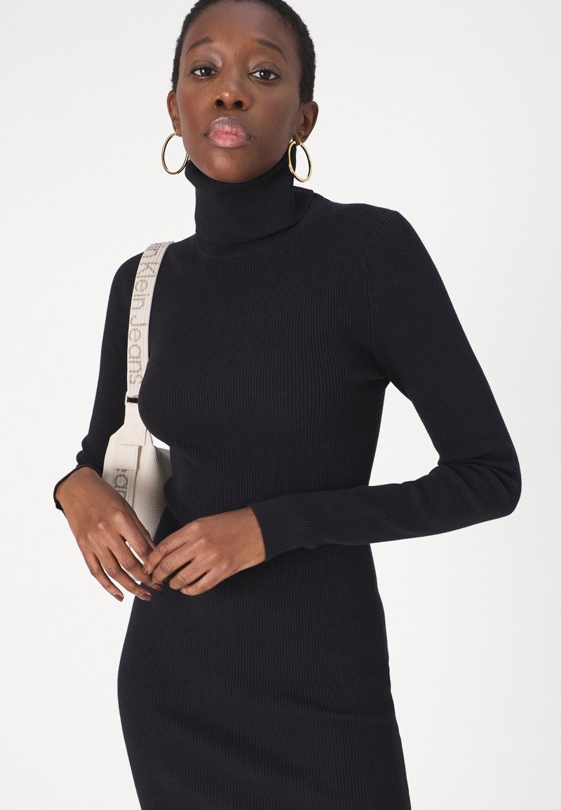 calvin klein black sweater dress Black & Gold Jersey Sequin Tunic Dress – Fleurty Girl