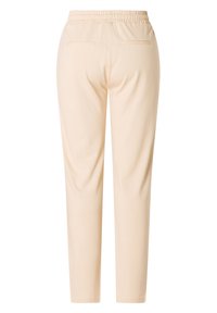 Beige broek met een elastische tailleband, twee achterzakken en een tapers ontwerp. Gemaakt van een soepele, lichte stof.
