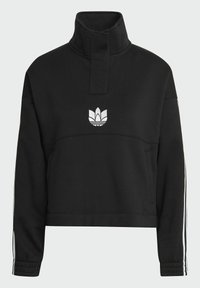Svart kortärmad sweatshirt med hög krage, vit broderad logotyp på bröstet och kontrasterande vita ränder på ärmarna. Tillverkad av mjukt material.