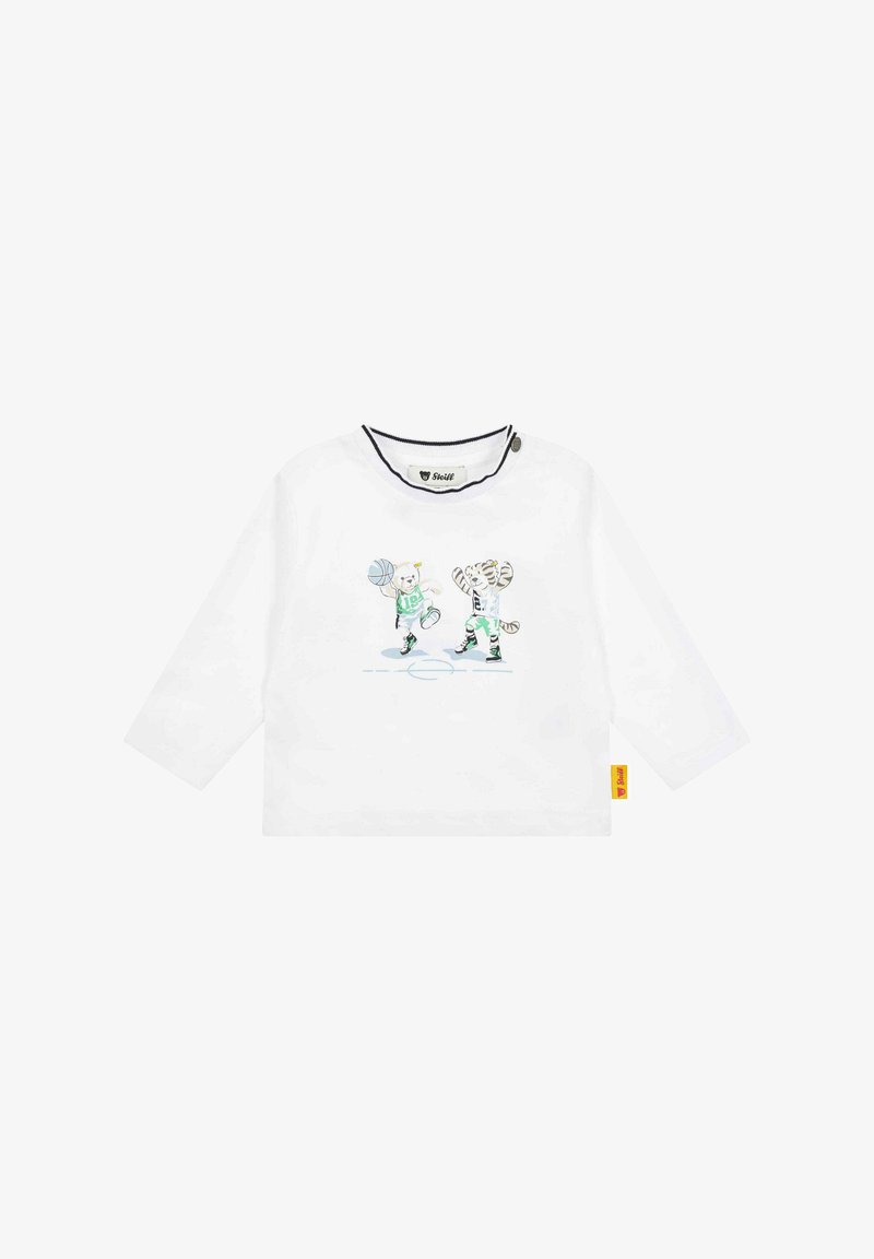 Camisa blanca de manga larga con cuello redondo, que presenta una colorida impresión de un oso y un tigre jugando al baloncesto. Etiqueta amarilla en el lateral.