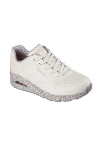 White sneaker with a smooth leather upper, perforated accents, and a textured grey leopard-print outsole. Features a padded collar and lace-up design.
