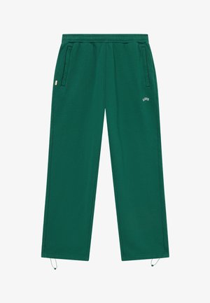 Tummanvihreät rentoistutetut collegehousut, joissa on joustava vyötärönauha, sivutaskut, pieni valkoinen "BLKVIS"-logo oikeassa reisessä sekä säädettävät nyörit lahkeensuissa.