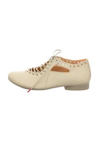 Beige leather shoe with a round toe, lace-up front, perforated detailing, and a brown accent on the side. Low heel design. Flat sole.