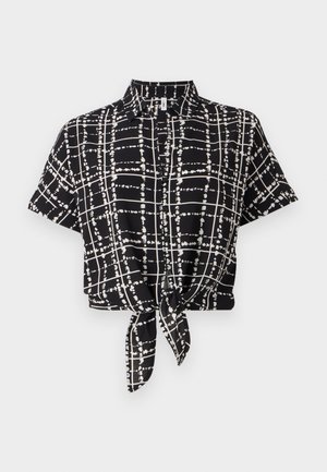 Musta lyhythihainen paita, jossa on valkoinen ruutukuosi ja etuosan solmu yksityiskohtana helman kohdalla. Valmistettu kevyestä materiaalista.