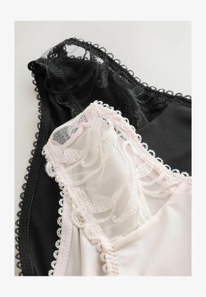 Dva krajkované tílka překrývající se, jedno černé s květinovou krajkou, druhé světle růžové s průsvitnými vyšívanými krajkovými panely.