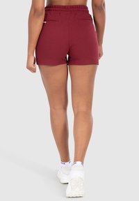 Smilodox FAYNE PRO - Pantaloncini sportivi - bordeaux