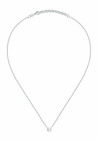 Collier en argent avec un petit pendentif en forme de trèfle à quatre feuilles et fermoir ajustable sur fond blanc.