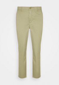 Ljust gröna bomullsbyxor med slim fit, med knappstängning, dragkedja och standardfickor. Slät textur och minimalistisk design.