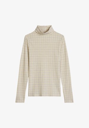 Long-sleeve, turtleneck top in cream with a grid pattern in light brown. Made of a soft, smooth material. Features a relaxed fit.