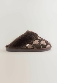 Brown slip-on slipper with dog silhouettes and soft plush lining, designed for indoor use with a flat sole.