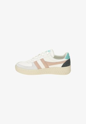 White sneakers with pink and teal accents, featuring a low-top design, lace-up closure, and textured rubber sole with ridges.