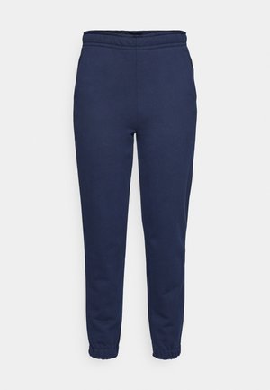 Marineblå joggebukser med elastisk midjebånd og ankelmansjetter, frontvinkel, laget av mykt stoff for fritidsbruk.