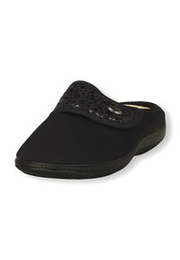 Scarpa nera slip-on con tomaia in tessuto morbido, caratterizzata da una fascia decorativa con motivo a fori e un bottone rotondo. Suola testurizzata.