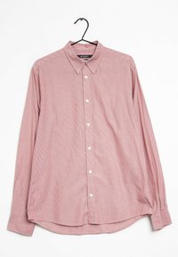 Camicia a maniche lunghe, con bottoni, di un rosa tenue con un sottile motivo a righe, realizzata in tessuto intrecciato, dotata di un collo classico e bottoni bianchi.