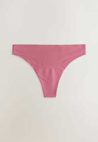 Rózsaszín tanga alsó, sima anyagból, minimalista dizájnnal. Alacsony derékvonallal és közepes hátkialakítással rendelkezik.