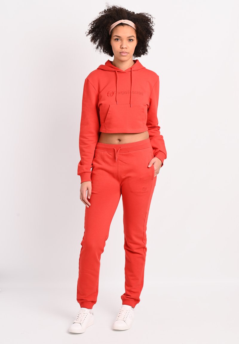 Damen Sportbekleidung | Sergio Tacchini AMANDAS Jogginghose molten lava/rot - LT19004 Damen Sportbekleidung | Sergio Tacchini AMANDAS Jogginghose molten lava/rot - LT19004
