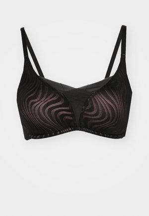 Reggiseno nero con un motivo ondulato, materiale trasparente, spalline regolabili e una finitura liscia. Progettato con una forma triangolare.