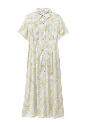 Robe blanche à manches courtes boutonnée avec un motif à carreaux jaune-vert et un col pointu.