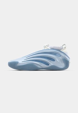 Light blue sneaker with a seamless design, curved lines, textured surface, and a white heel support; features a pull tab for easy wear.
