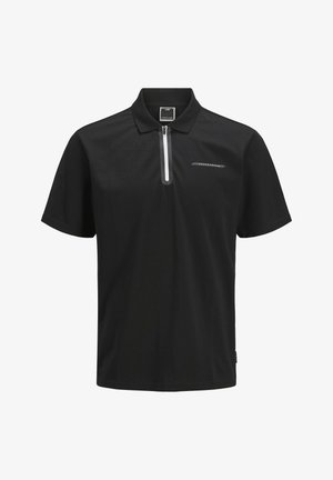 Polo shirt nera a maniche corte, con zip bianca e logo sul petto sinistro. Realizzata in tessuto liscio e leggero.