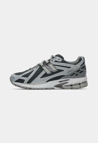Men's running shoe in grey and black mesh with a cushioned sole. Features reflective accents and a lace-up design for secure fit.
