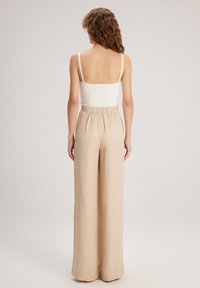 adL WIDE LEG  - Broek - Beıge