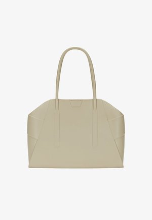 Sac fourre-tout en cuir beige au design structuré, avec deux longues poignées et des coutures angulaires pour une texture et un intérêt visuel supplémentaires.