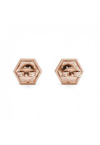 Camicie esagonali in oro rosa con una finitura lucida, decorate con piccoli cristalli trasparenti attorno ai bordi e un elemento decorativo centrale.