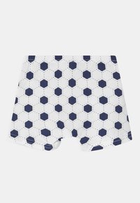 Hvite boksershorts med et marineblått sekskantet mønster og stiplete linjer, laget av bomull, med en myk linning for komfort.