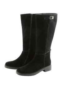 Bottes noires en daim à hauteur de genou, avec une fermeture éclair sur le côté, semelle plate et détails de couture subtils, présentant un petit accent métallique sur le dessus.