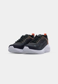 Black athletic shoes with a mesh upper, orange accents, and white rubber sole. Features lace-up closure and padded collar for comfort.